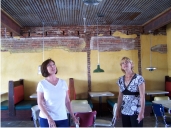 Andrea Oliver shows Deb Hill around new restaruant